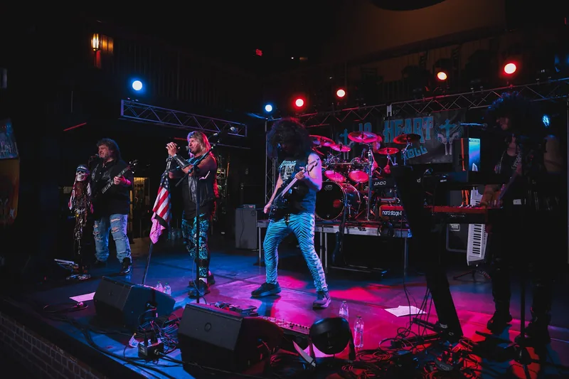 18@Heart on stage under red and blue lights